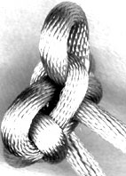 stem view of button style 4 eared flower knot in grey satin cord