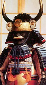 samurai armour with a number of knots hanging on it